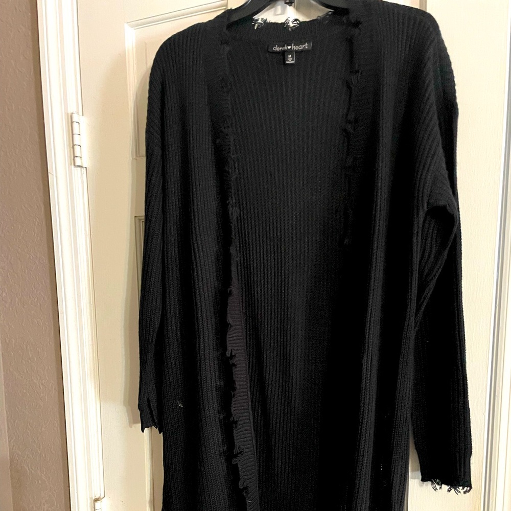 Woman’s black long ribbed open front sweater cardigan